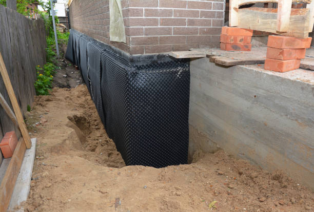 Happy homeowners after waterproofing job in Rushsylvania